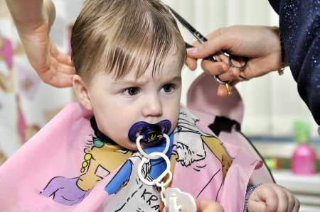 Hairstyle of the one-year-old child first timeの写真素材