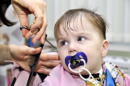 Hairstyle of the one-year-old child first timeの写真素材