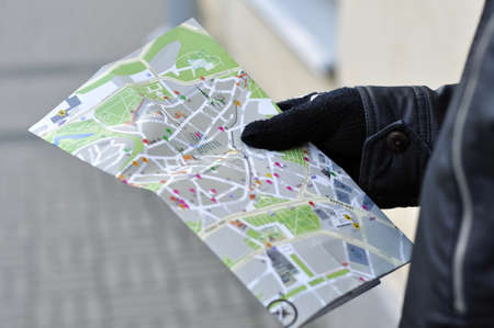 Map of Tallinn in hand at the manの写真素材