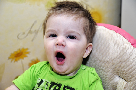 Yawning babyの写真素材