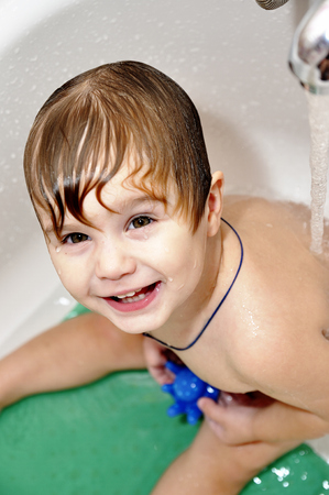 Portrait baby in bathroomの写真素材