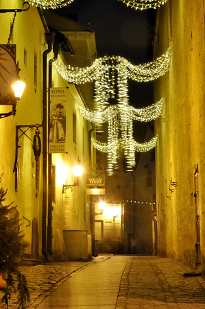 Night view on old city town street in Tallinn, Estoniaの写真素材