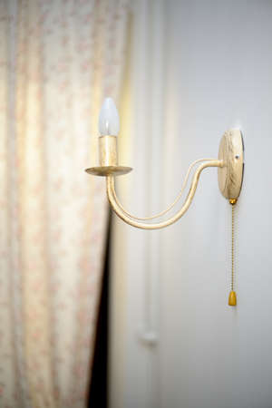 Lamp on a wallの写真素材