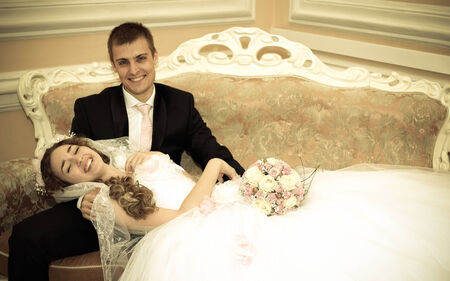 Happy bride and groom on their weddingの写真素材