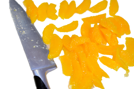 Fresh ripe orange tangerines with knife isolatedの写真素材