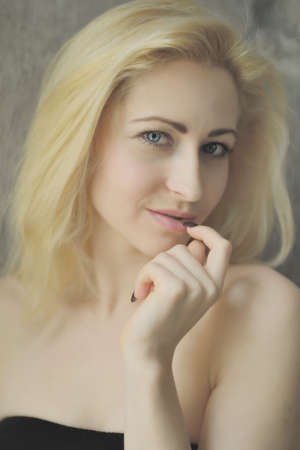 Portrait close up of young beautiful blonde womanの写真素材