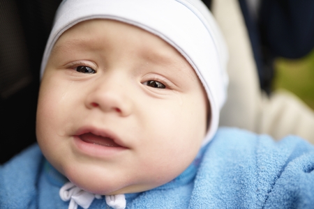 Portrait of the small child who criedの写真素材