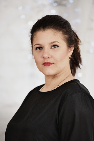 Portrait young woman. Daisy background.の写真素材