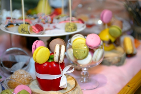 Table served sweet dessert and fruitsの写真素材