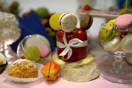 Table served sweet dessert and fruitsの写真素材