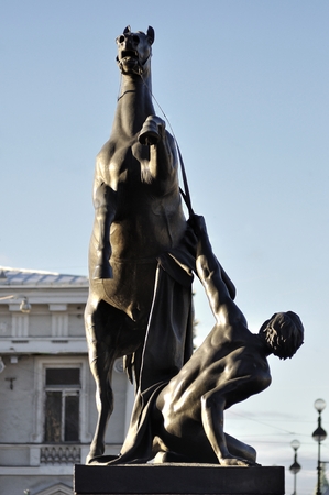 Sculpture Horse Tamers on Anichkov Bridge across Fontanka River, Saint-Petersburg, Russiaの写真素材