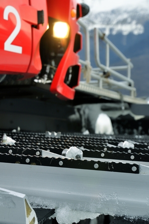 Detail of red ratrak in winter sceneryの写真素材