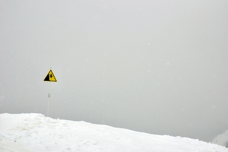 Danger steep cliff mountain signの写真素材