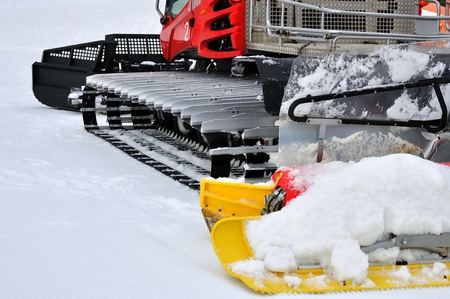 Detail of red ratrak in winter sceneryの写真素材