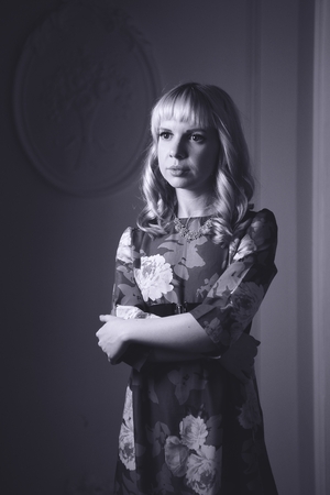 Black and white portrait of lovely woman in dressの写真素材