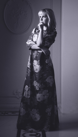 Black and white portrait of lovely woman in dressの写真素材