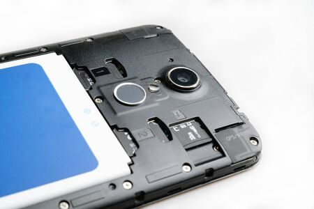 Modern mobile phone with fingerprint sensor isolatedの写真素材