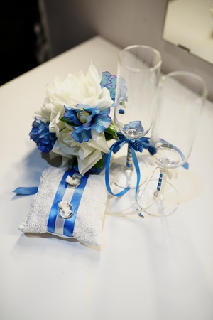 Wedding rings, goblets, flowers and accessoriesの写真素材