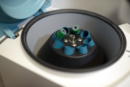 Medical laboratory centrifuge with a test tube insideの写真素材