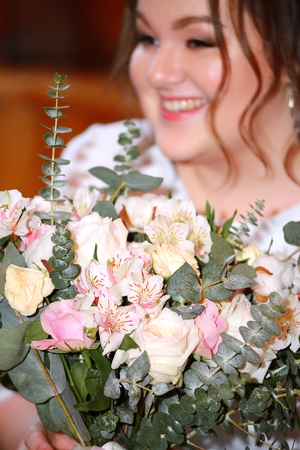 Bride with flowers on the wedding dayの写真素材