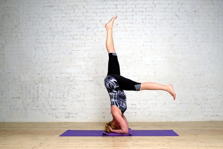 Adult woman practicing yoga