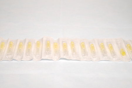 Unused medical needles in the packageの写真素材