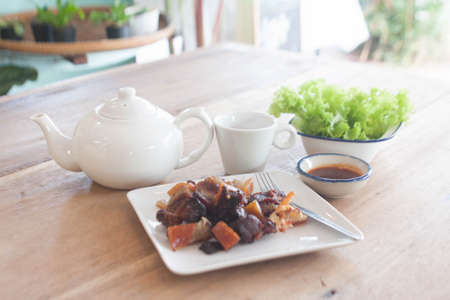 Breakfast set, delicious roast pork with tea in the morningの写真素材