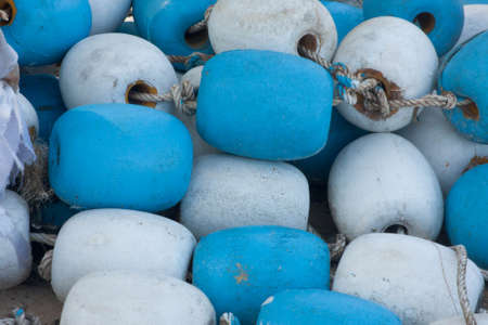 A blue and white floating buoy located in front of Patong Beach of Phuket in Thailand.