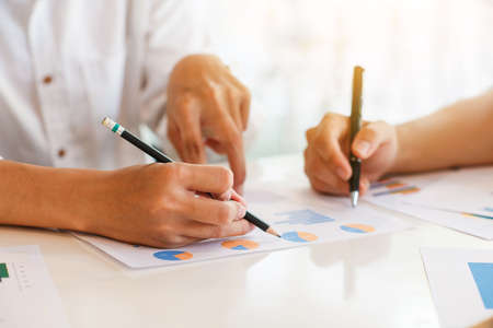 Business Corporate team brainstorming with chart and checking and analysis