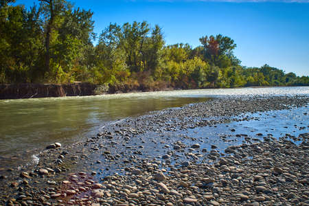 Kuban river with pebble beaches on a bright summer sunny day. North Caucasus, Stavropol regionの写真素材