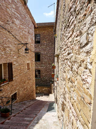 Italy Umbria Assisi summer, views of the city, narrow streets, medieval houses monumentsの写真素材
