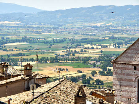 Italy Umbria Assisi summer, views of the city, narrow streets, medieval houses monumentsの写真素材