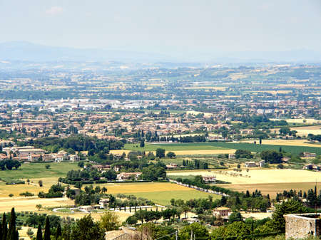 Italy Umbria Assisi summer, views of the city, narrow streets, medieval houses monumentsの写真素材