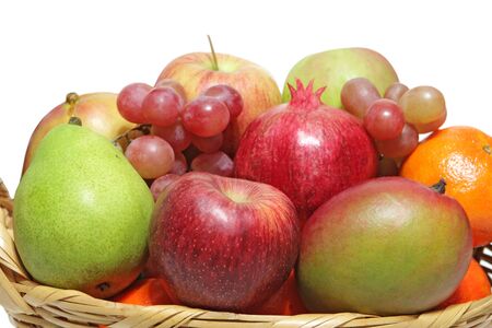 Basket of fruits isolated on white backgroundの写真素材