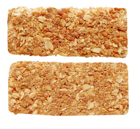 two sides of oat granola bar isolated on whiteの写真素材
