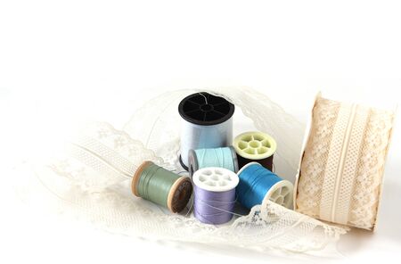 Thread and lace in faded background