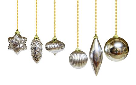 Set of Christmas silver ornaments over whiteの写真素材