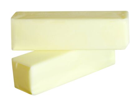 Two butter sticks isolated over white backgroundの写真素材