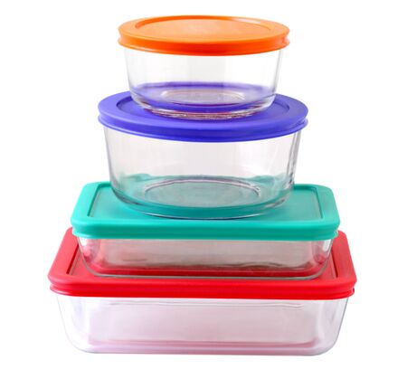 Stack of glass food containers isolated on whiteの写真素材