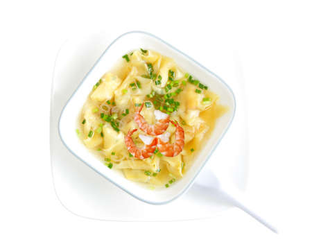 Bowl of wonton soup isolated on whiteの写真素材