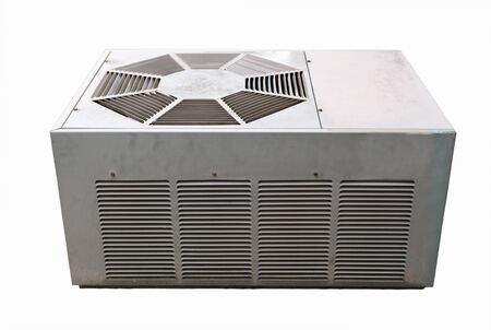 Old air conditioner outside unit isolated on whiteの写真素材
