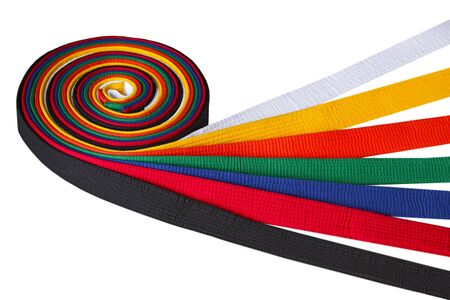 Tae kwon do belt rank from low to high white, yellow, orange, green, blue, red, and blackの写真素材