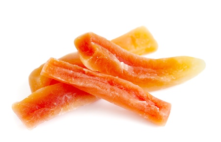 Dried papaya sticks over white backgroundの写真素材