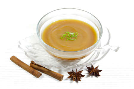 Homemade skin on Applesauce apple sauce with cinnamon, anise and garnished with lime zestの写真素材