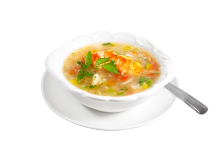 Bowl of lobster seafood chowder soup isolated on whiteの写真素材