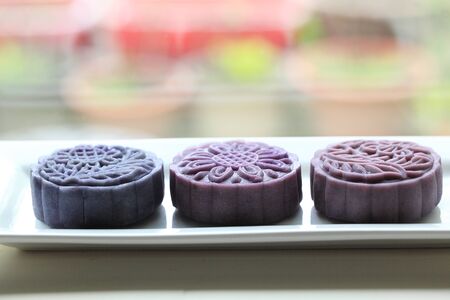 Purple moon cake make from Baby purple potatoes filling with mung bean