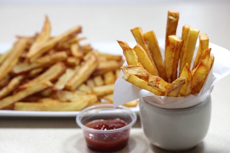 Homemade french fries with tomato sauceの写真素材