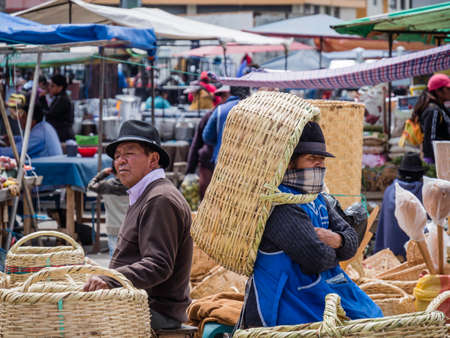 Saquisili, Ecuador - May 2, 2019 - indigenous people selling in the Saquisili market in the Cotopaxi region of Ecuador, South Americaのeditorial素材