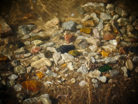 Texture of stones under water in the seaの写真素材