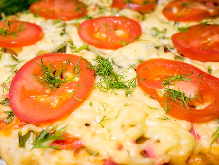 Italian pizza with meat, tomatoes ,dill and double cheese